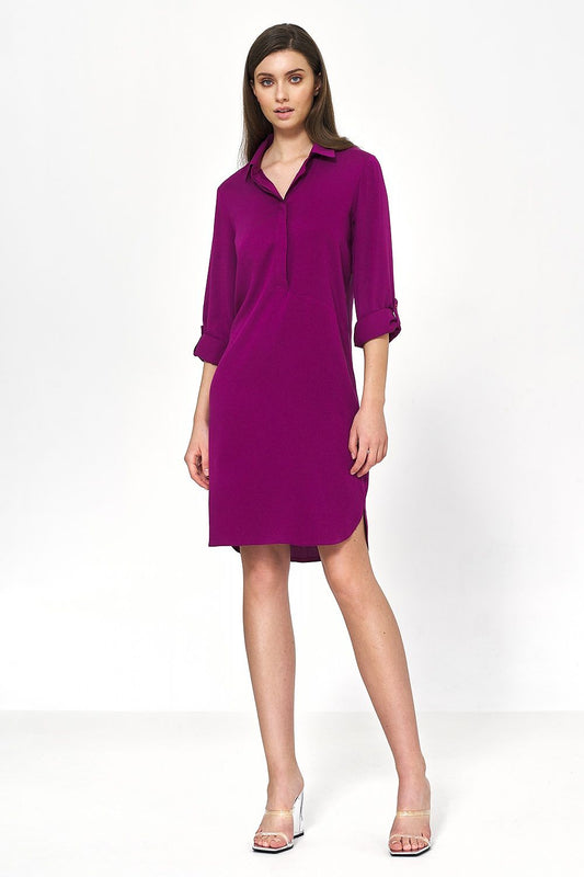 Stylish front view of the Nife oversized viscose daydress, highlighting its versatile design and sophisticated collar detail.