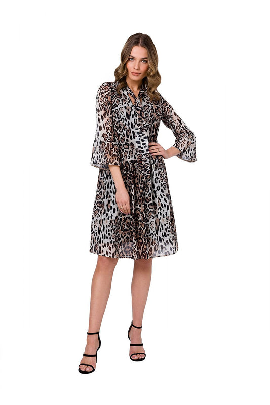 Elegant view of the Stylove Ethereal Chiffon Daydress in leopard print, worn by a model, accentuating the flowing silhouette and elbow-length sleeves, perfect for chic daytime occasions.