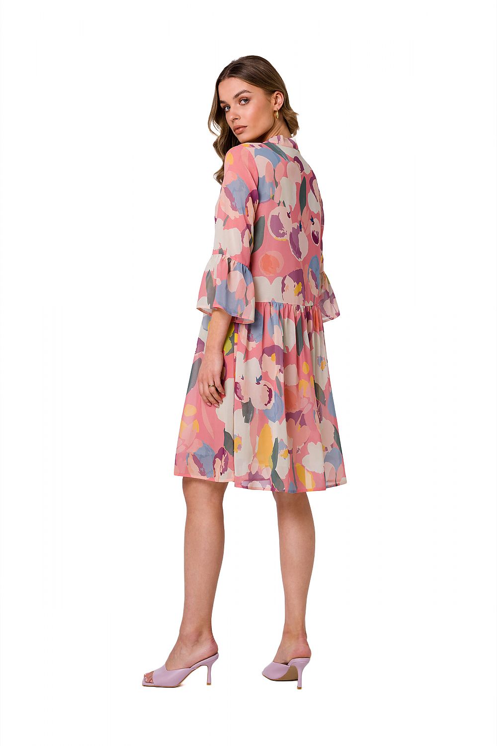 Stylove ethereal chiffon daydress featuring a vibrant, abstract floral pattern with elbow-length sleeves, elegantly styled for a sophisticated look.