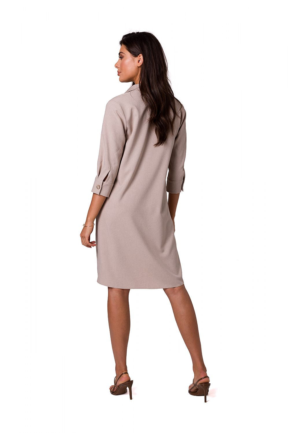 Elegant BeWear shirt dress in a soft beige tone showcased from the back, featuring a flared neckline and sleeves, perfect for a sophisticated look at work or on vacation.