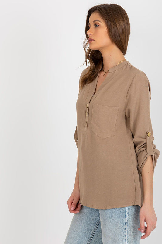 Chic side profile of the Rue Paris cotton blend blouse, showcasing the heart-shaped neckline and button details, designed for luxurious comfort and style.