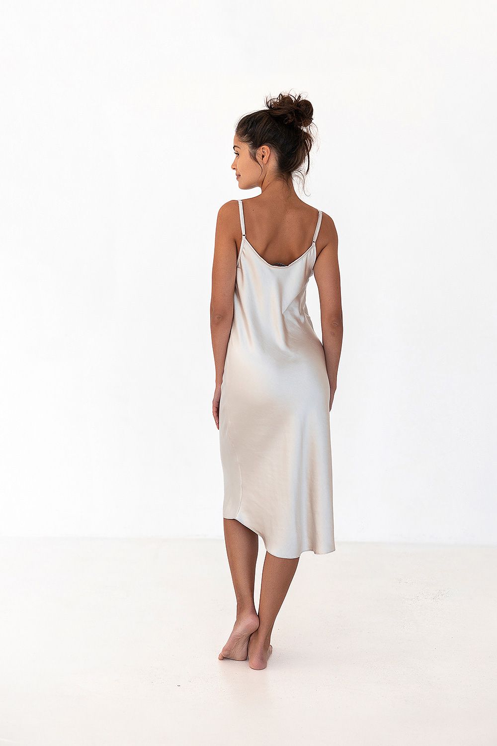 Rear view of the luxurious satin nightshirt for women by Sensis, showcasing thin straps and sleek design, ideal for a chic and comfortable lounging experience.