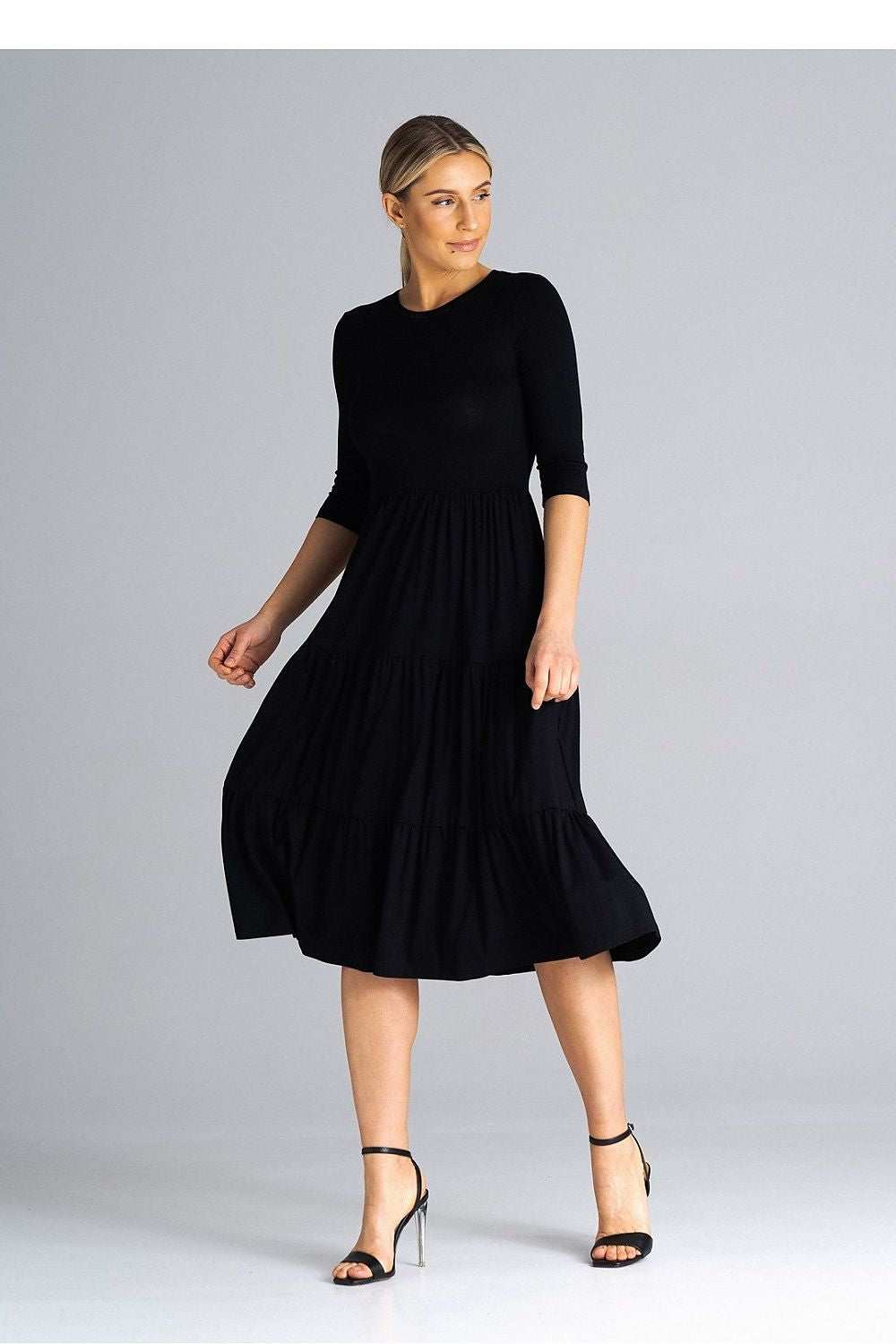 Stylish Figl midi dress adorned with delicate crinkled ruffles, a true representation of classic elegance for special occasions.