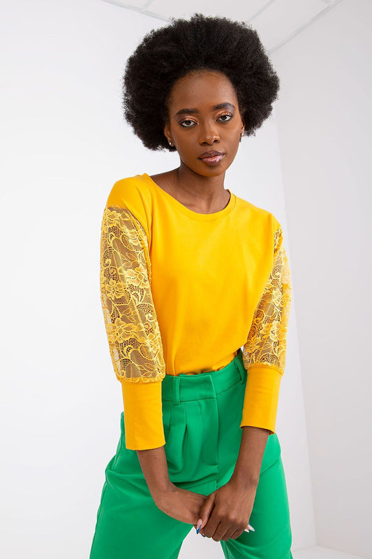 Stylish Rue Paris blouse showcasing intricate lace details on 3/4 sleeves, crafted from high-quality cotton-spandex blend for ultimate comfort and elegance.
