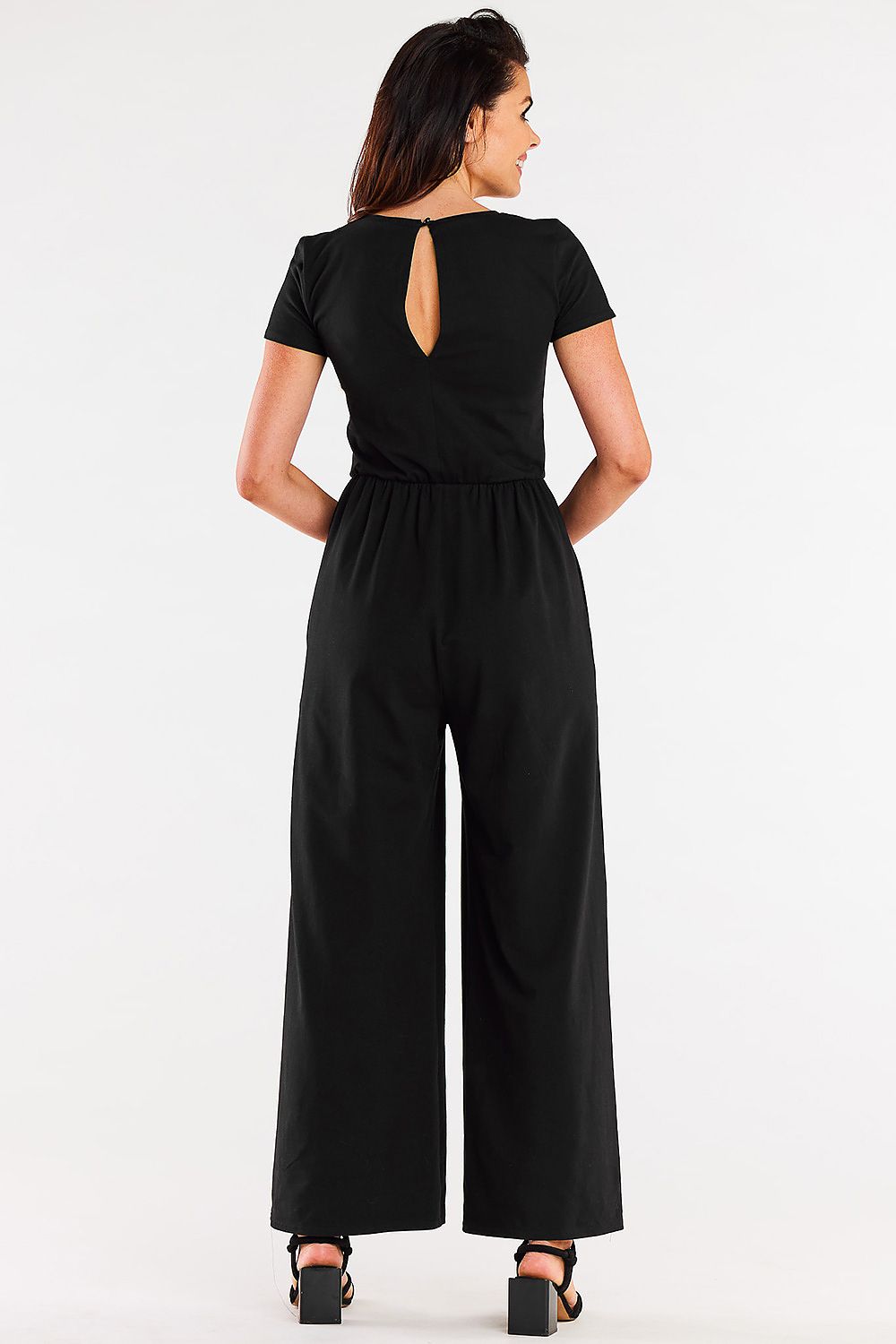 Stylish Infinite You jumpsuit featuring a heart neckline and crinkled elastic waist, accentuating sophisticated style and softness.
