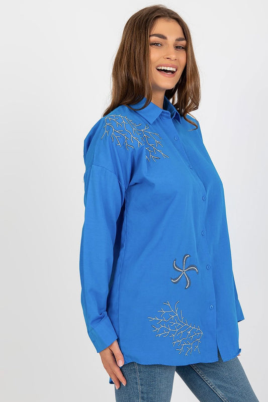 Close-up view of the intricate embroidery on a luxury women's cotton blend shirt, designed for elegance and comfort. Shop at Factory Price.