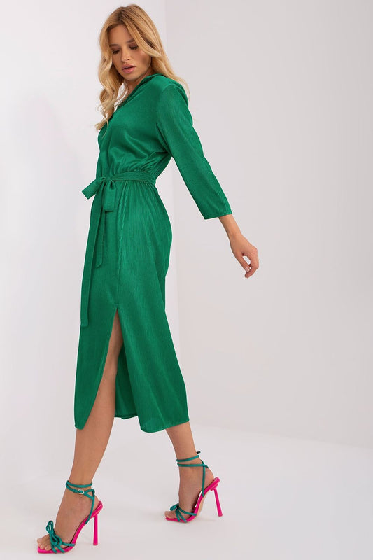 Stylish Lakerta dress showcasing the exquisite ribbed texture, designed with a flattering waist tie and slits, perfect for sophisticated occasions.