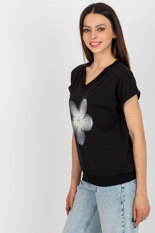 Elegant cotton blouse designed by Rue Paris, featuring short sleeves and a decorative print, perfect for adding a touch of luxury to your wardrobe.
