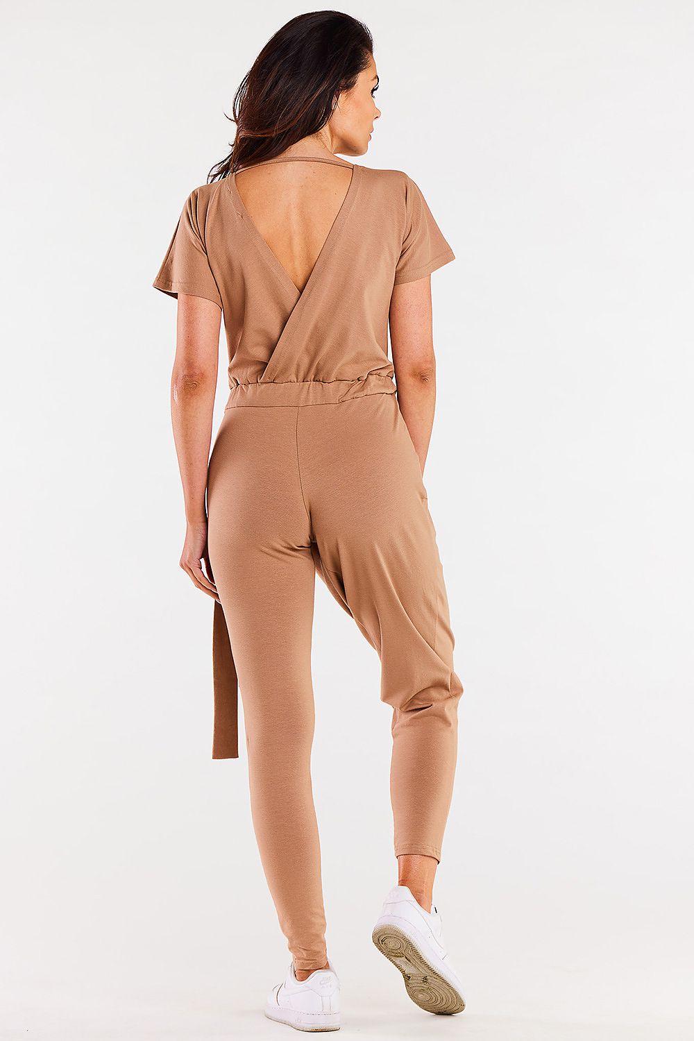 Complete view of Infinite You's luxury jumpsuit, showcasing its crinkled texture and tailored fit for a refined look.