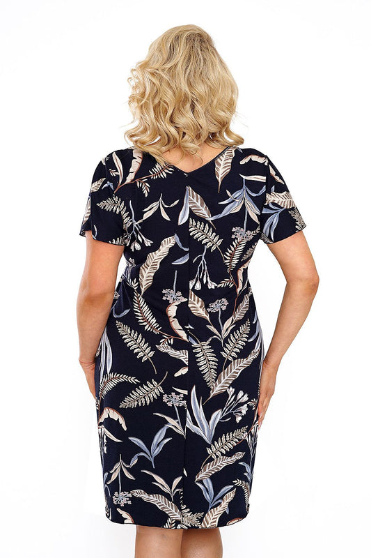 Rear view of a sophisticated navy blue nightshirt by Donna, highlighting the intricate floral design and subtle lace detailing on short sleeves.