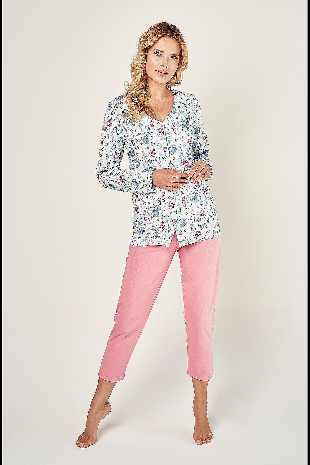 Elegant women's luxury cotton pajamas set by Taro featuring a stylish long sleeve button-down shirt adorned with a floral pattern and smooth pink fisherman pants, ideal for comfortable lounging.