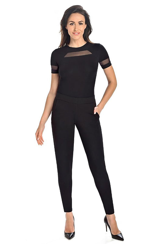 Close-up of the refined translucent mesh detail on the neckline and sleeves of the luxury bodysuit by Teyli, tailored for sophistication.