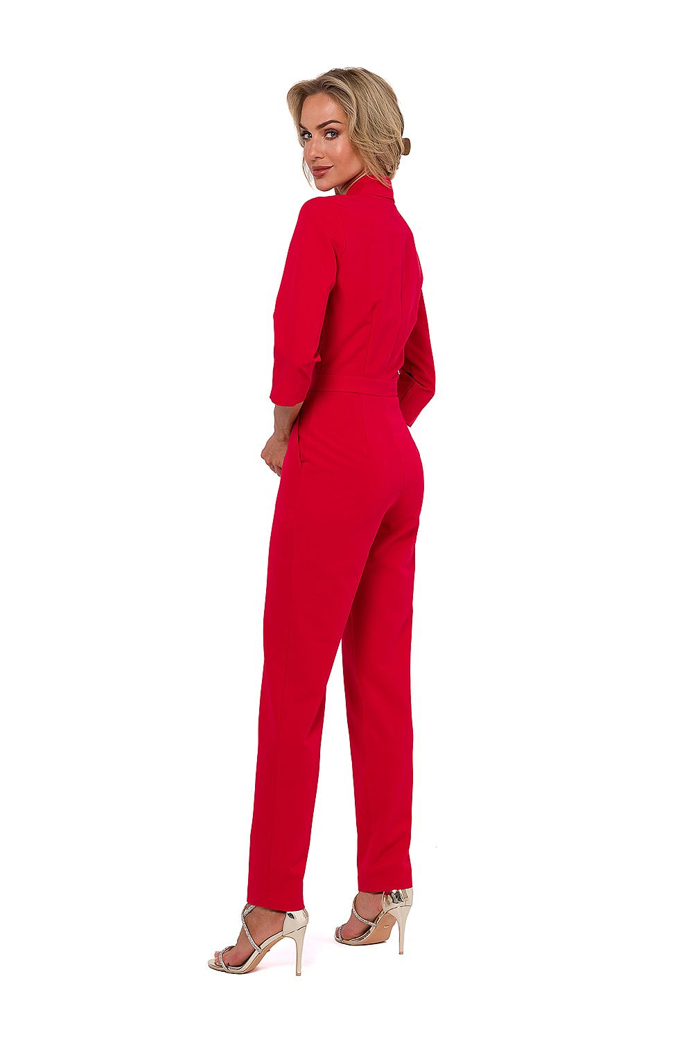 Luxuriously designed 3/4 sleeve jumpsuit in an elegant fabric blend, crafted by Moe in Poland for an upscale fashion statement.