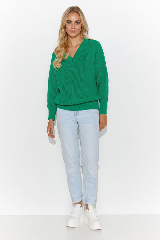 Luxury Makadamia Classic Sweater showcasing a loose fit design perfect for versatile styling.