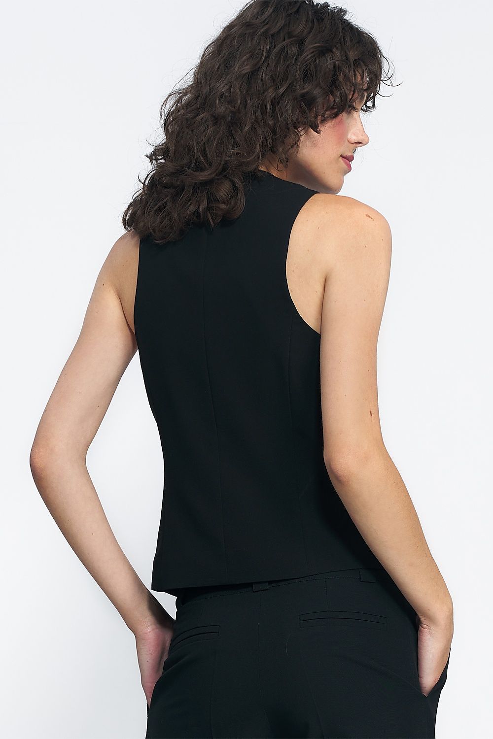 Versatile Nife slim fit vest for women, crafted from premium materials, exemplifying luxury and sophistication.
