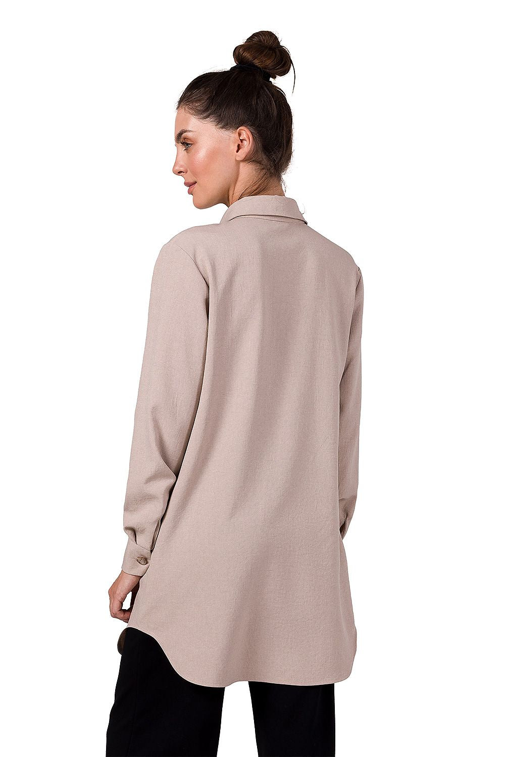 Chic BeWear Tunic with a semicircle hem, long sleeves with button cuffs, and a practical front pocket, embodying luxury and elegance, made with premium polyester.