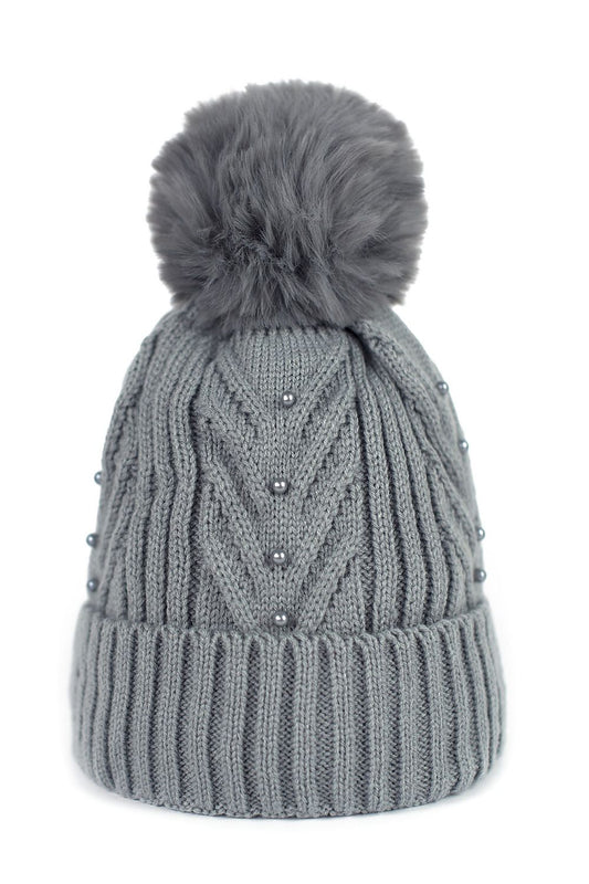 Elegant stretchy acrylic cap with pom-pom by Art of Polo, perfect for autumn-winter fashion and comfort.