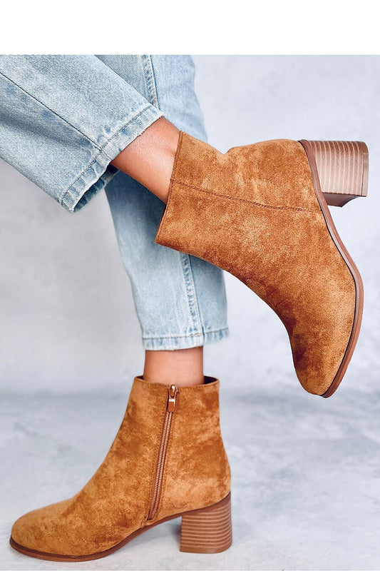 Stylish Inello women's eco-suede heel boots showcasing a sophisticated design with a practical side zip, crafted for a comfortable fit and warm fur interior.
