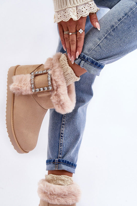 High-quality snow boots featuring plush fur lining and eco-friendly suede, ideal for maintaining warmth in cold weather.