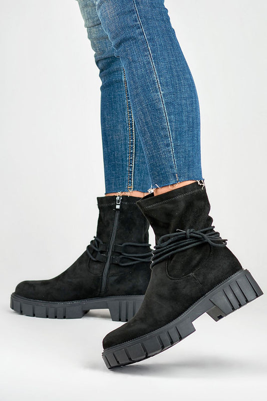 Elegant PRIMO eco-suede leather boots with a fashionable round toe design, showcasing a lavish padded insole and a practical zipper for easy wear, perfect for enhancing your winter wardrobe.