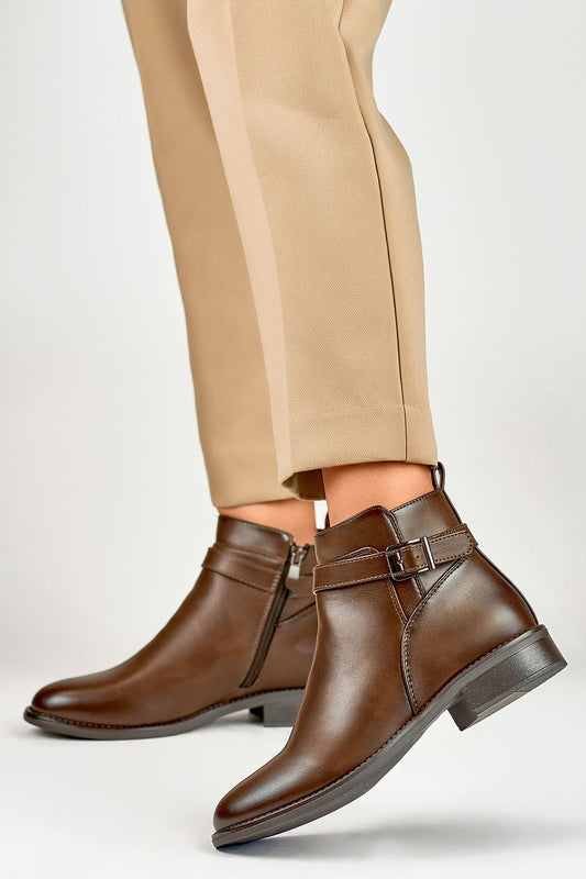 Close-up of PRIMO Eco-Leather ankle boots showcasing the sophisticated materials and elegant design suitable for stylish autumn and winter outfits.