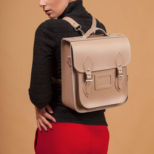 Stylish Iced Coffee City Backpack with adjustable straps, available in two sizes for laptops and tablets; a combination of traditional craftsmanship and modern design.