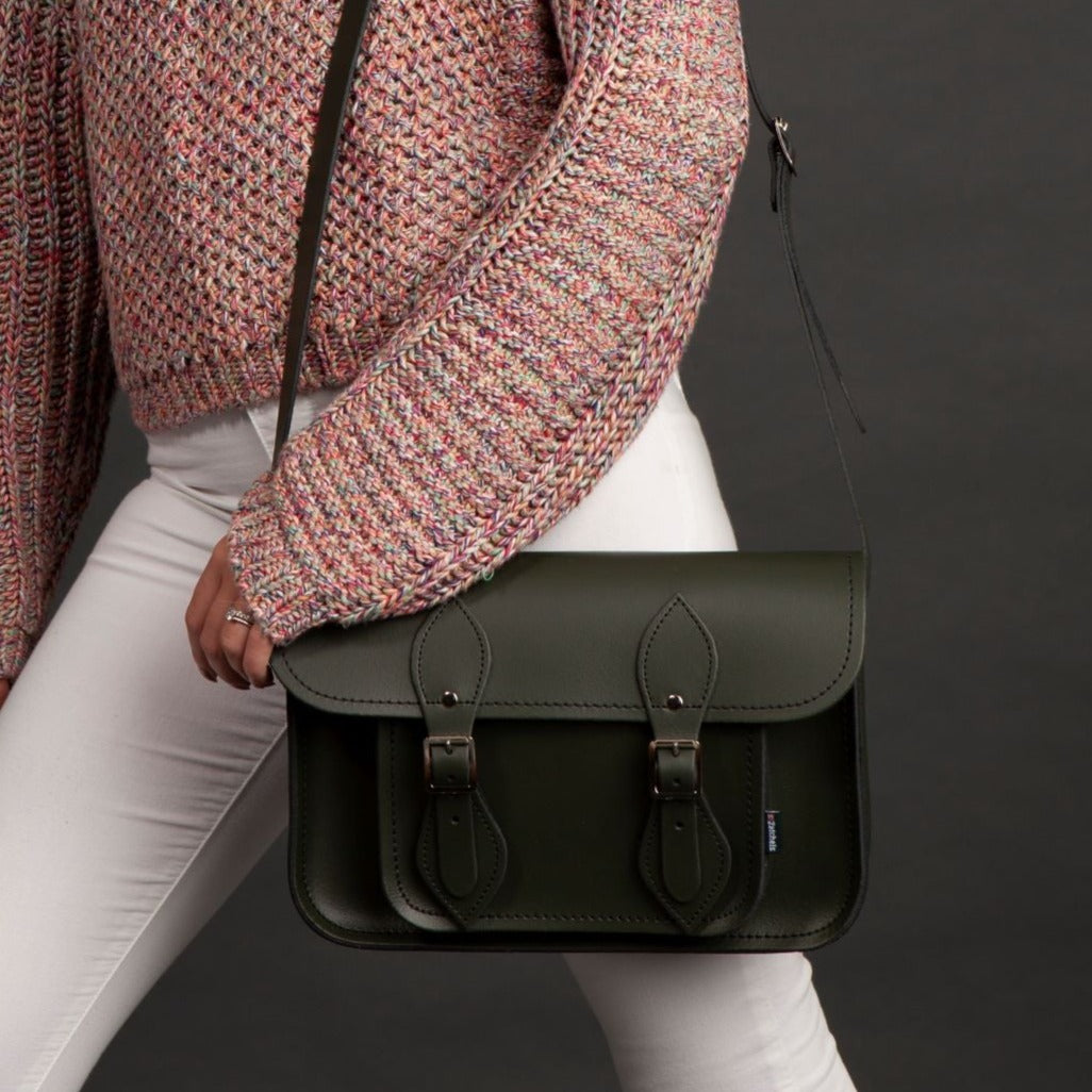 Personalised Luxury Leather Satchel in Ivy Green, featuring adjustable strap and options for customisation, perfect for carrying tablets and laptops elegantly.