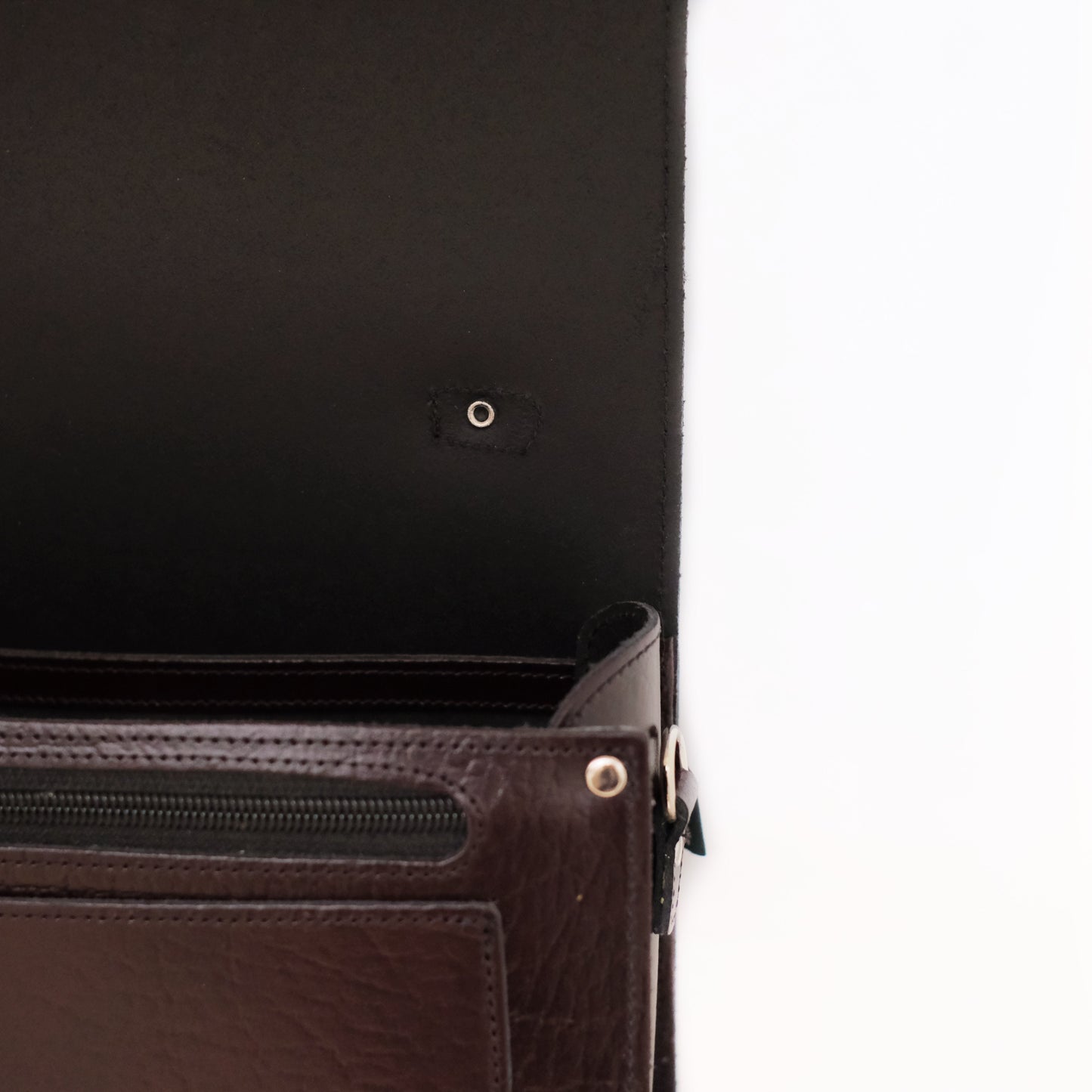 Lifestyle image featuring the Luxury Leather Sugarcube Grande Bag in marsala red, epitomising sophistication and timeless luxury.