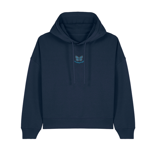 Close-up detail of the sky-blue butterfly embroidery on the Adonis Blue Cropped Hoodie, highlighting exquisite craftsmanship and nature-inspired design for effortless elegance.