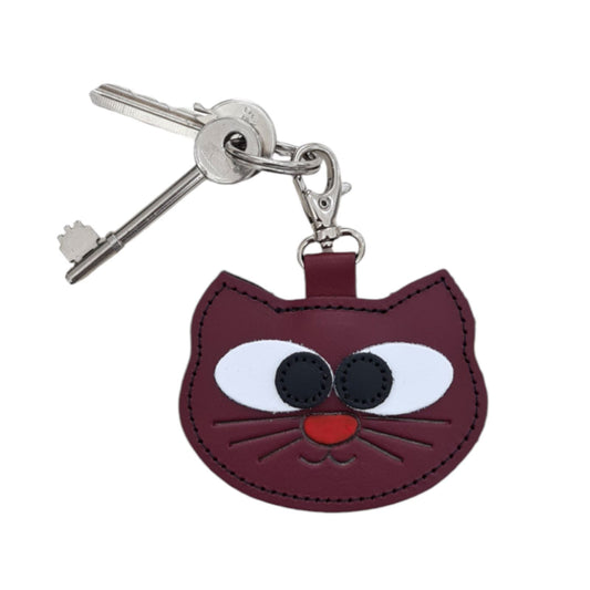Close-up of the Zatchels Oxblood Red Cat Bag Charm, showcasing intricate hand-stitching and premium leather quality, perfect for stylish lovers of cat-themed accessories.