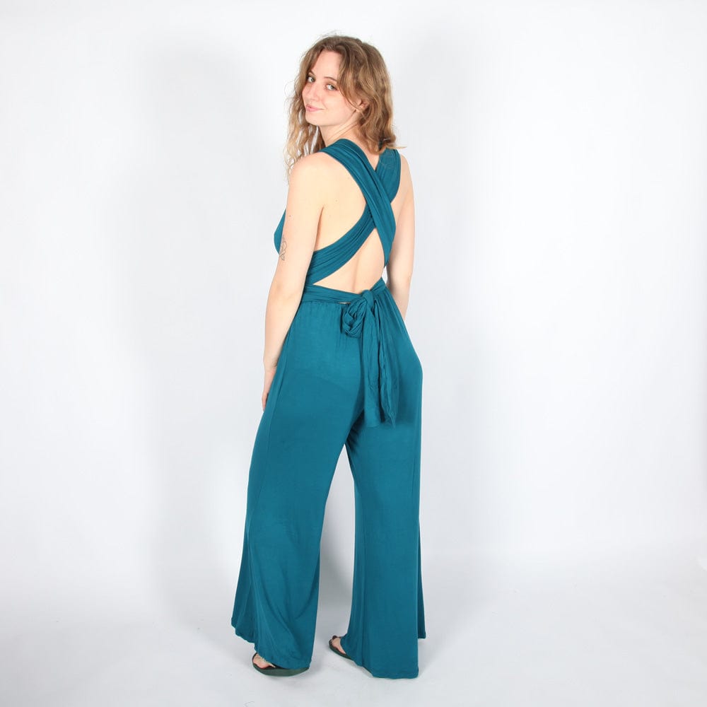 Fashion-forward multiway jumpsuit worn by a model, demonstrating the luxurious V-neck and sophisticated backless design for a statement look.