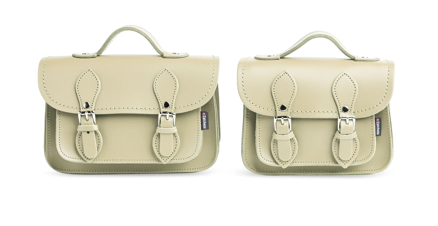 Close-up of Zatchels Micro Satchel's magnetic quick-open fastenings, reflecting luxurious detailing and exceptional craftsmanship in a stunning pastel leather finish.