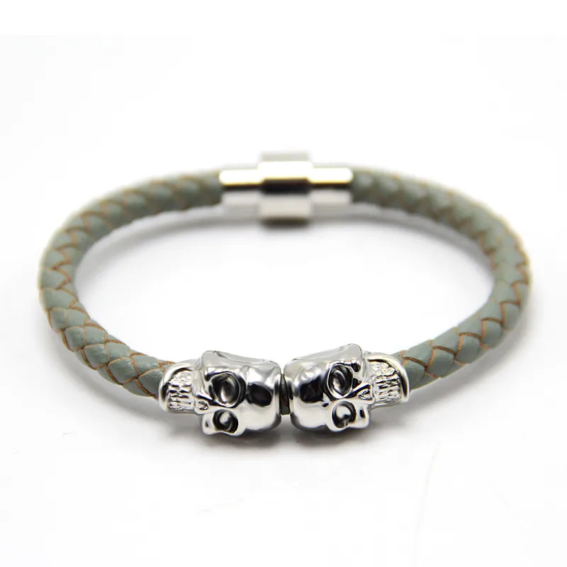 Elegant view of the punk skull bangle, showcasing its unique blend of leather and copper materials, a statement piece for discerning gothic accessory enthusiasts.