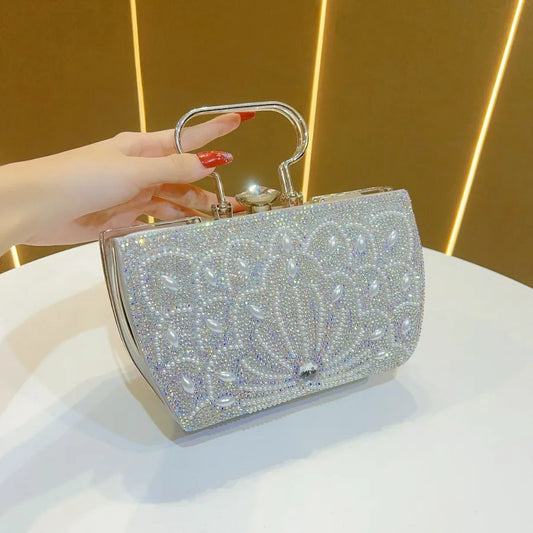 Elegant evening clutch bag for formal events, featuring a glamorous diamond embellishment, perfect for carrying essentials like phone and makeup, lightweight design for a comfortable carry.