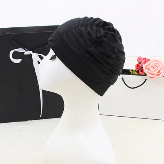 Elegant solid colour nylon swimming cap for adults, showcasing a sleek design and premium material, ideal for fashionable aquatic adventures.