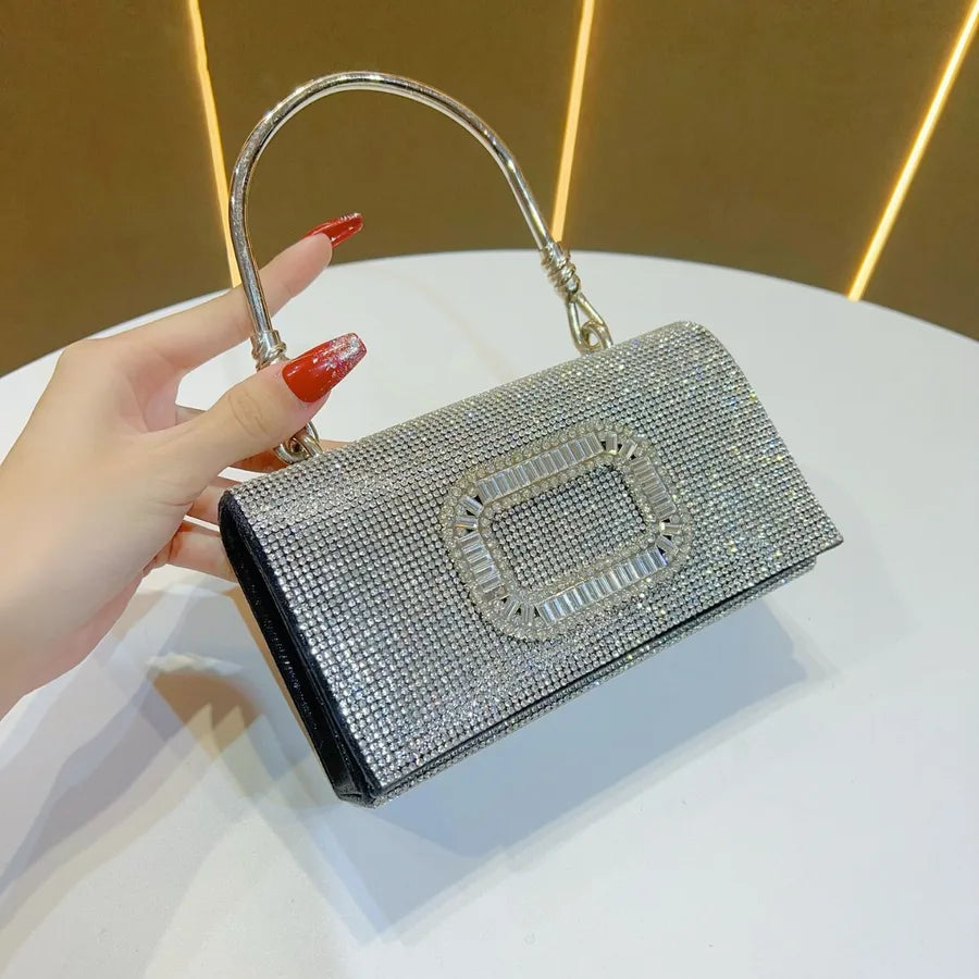 Fashionable square clutch with luxurious diamond accents, perfect for enhancing any formal outfit.