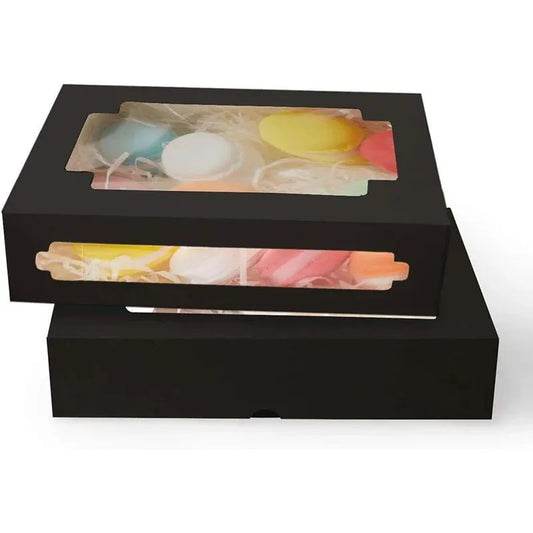 Whimsical white dessert packaging featuring a clear window, ideal for displaying gourmet macarons and exquisite pastries.
