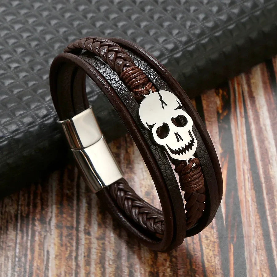 Stylish 304 stainless steel and PU leather braided bracelet for men, showcasing a bold punk skull motif, perfect for Halloween and daily wear.