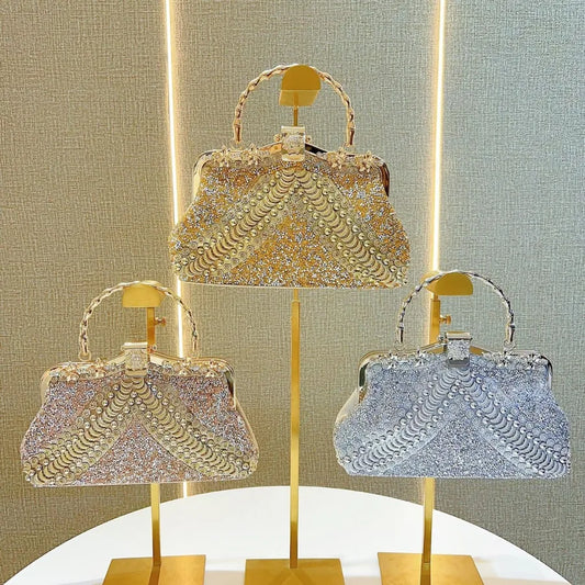 Elegant luxury clutch bag with diamond embellishments, showcasing a chic pillow shape design and single shoulder strap, crafted from high-quality PVC.