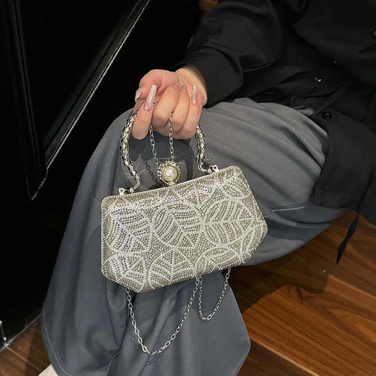 Close-up of the exquisite diamond details on the luxurious retro square box evening bag, highlighting its refined craftsmanship and upscale design.
