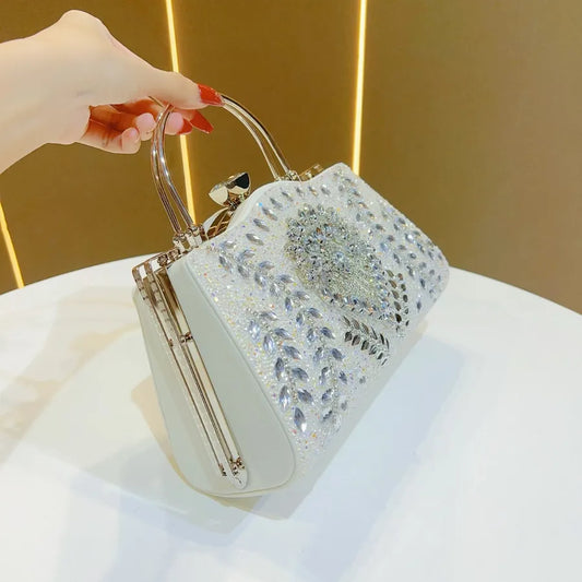 Close-up detail of the diamond embellishments on a stylish women's evening handbag, highlighting its elegant craftsmanship and sophisticated design.