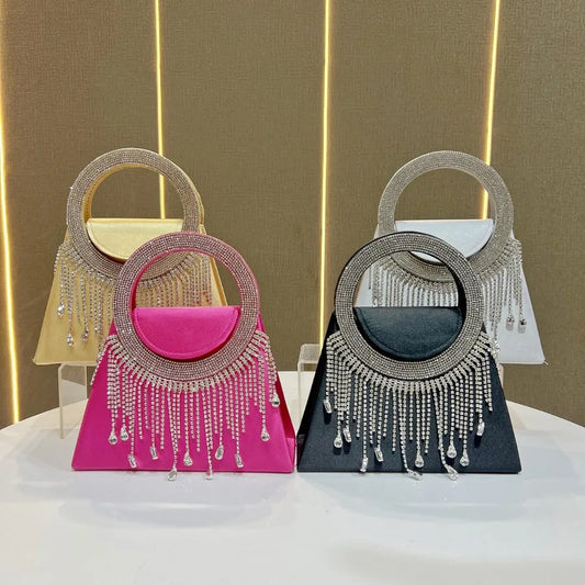 Close-up view of the diamond accents on the luxury evening handbag, highlighting the exquisite craftsmanship and attention to detail.