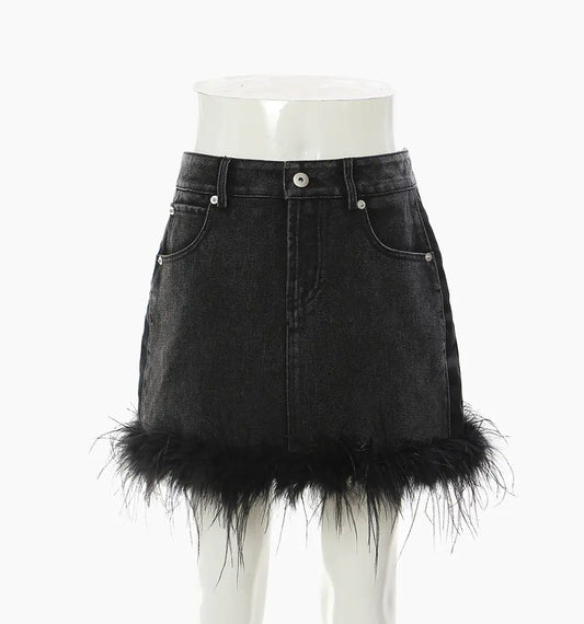 Feathered Elegance A-Line Denim Skirt for Women displayed on a mannequin, featuring a stylish high-rise silhouette and whimsical feather detailing.