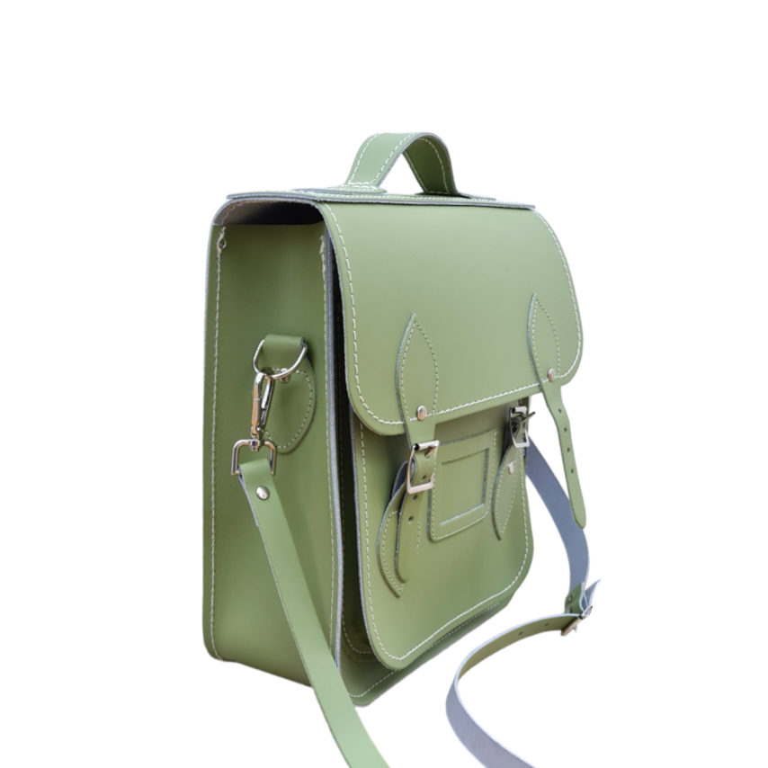 Custom engraving options on the sage green leather city backpack, allowing personalization for a unique touch on a luxury accessory.