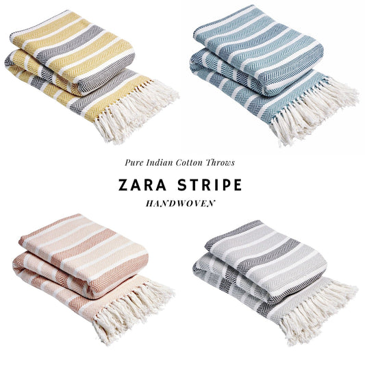 Elegant handwoven Zara Pure Cotton Throw Blanket featuring chic tassels, available in multiple sizes for versatile home décor and comfort, ideal for sofa or bed use.