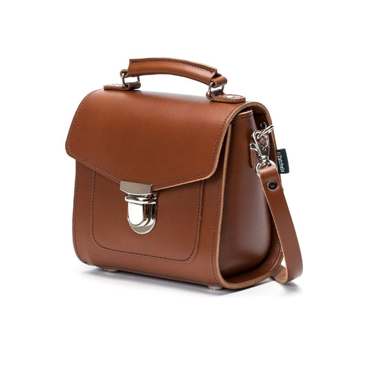 Stylish Chestnut Leather Sugarcube Handbag with adjustable strap, perfect for versatile carrying options.