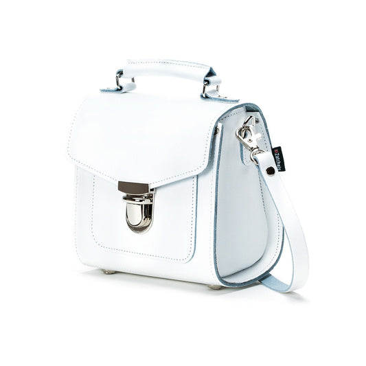 Close-up view of the chic Handmade White Leather Sugarcube Handbag, highlighting its exquisite craftsmanship and stylish push-lock closure.