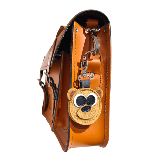 Unique Tannery Leather Keychain in the shape of a brown bear, featuring distinctive hand-stitched design for a bespoke touch.