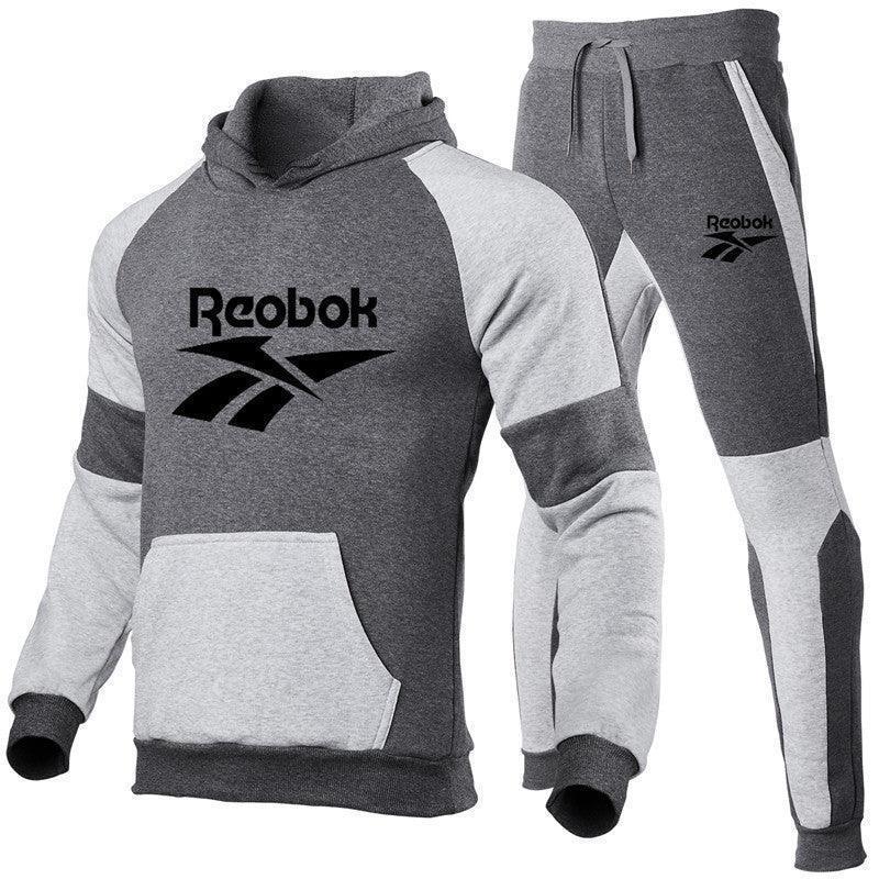 Stylish unisex sports tracksuit set featuring a modern hoodie and joggers, perfect for casual wear and workouts, made from high-quality breathable material.