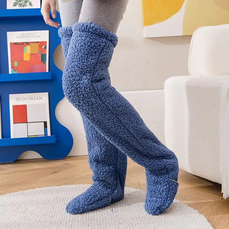 Luxuriously Soft Women's Teddy Socks featured in a vibrant blue hue, perfect for winter warmth and style. These one-size-fits-all socks are washer and dryer-friendly, ensuring ease of maintenance while keeping you cosy.